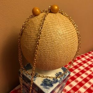 Basket woven ball purse palm size